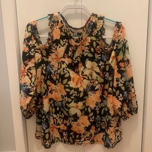 A floral Lauren Conrad blouse, size medium.